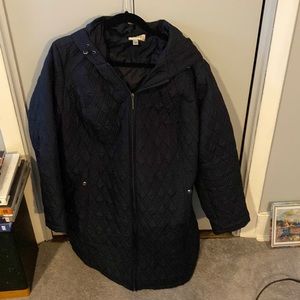Woman’s size 26/28 quilted jacket with hood and pockets. Navy blue.